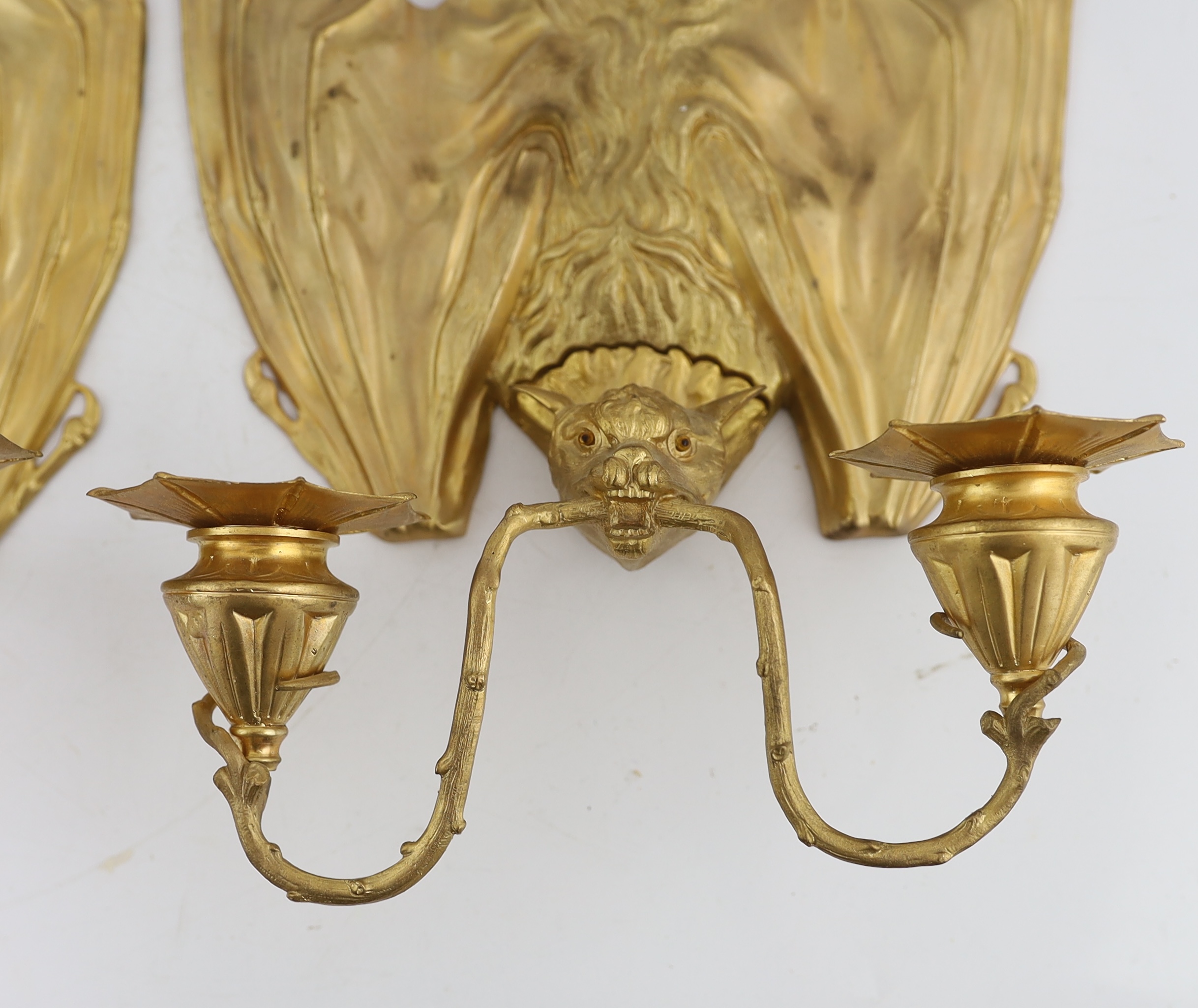 After William Tonks & Sons for Liberty & Co. of London, a pair of Victorian ormolu wall brackets modelled as hanging bats